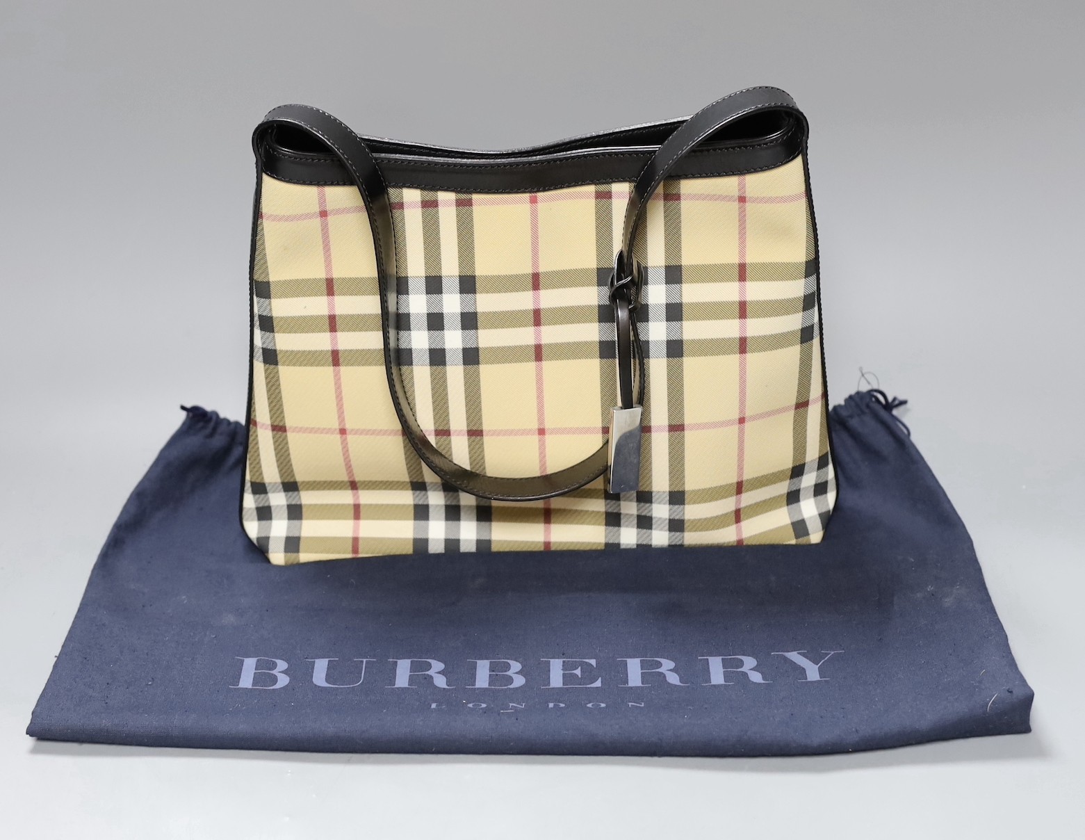 A Burberry shoulder bag with original receipt and dust bag, 24 cms high x 30 cms wide